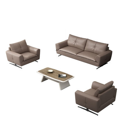 Sofa van grijs leer voor de montage van kantoormeubilair
